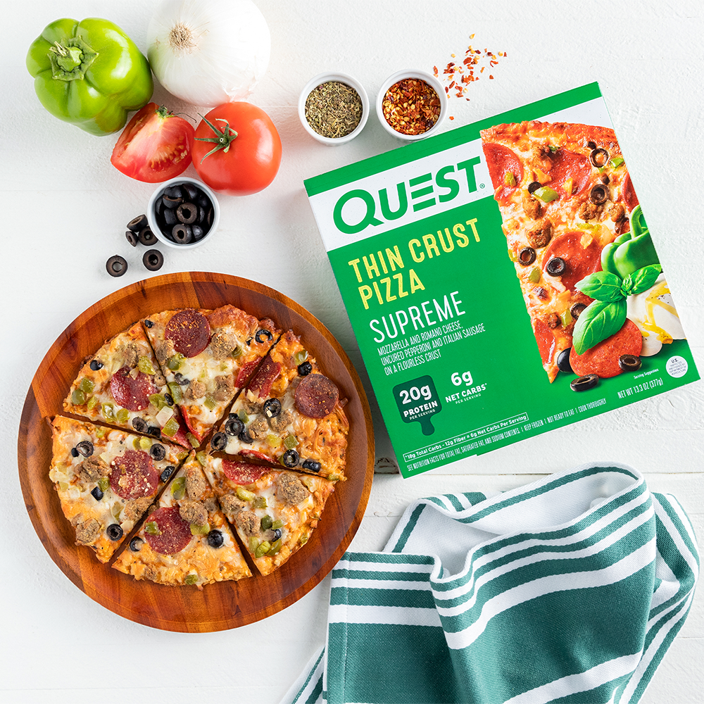 supreme-pizza-e1 QN_US_ThinCrustPizza_Supreme_103210_Tabletop_01.png
