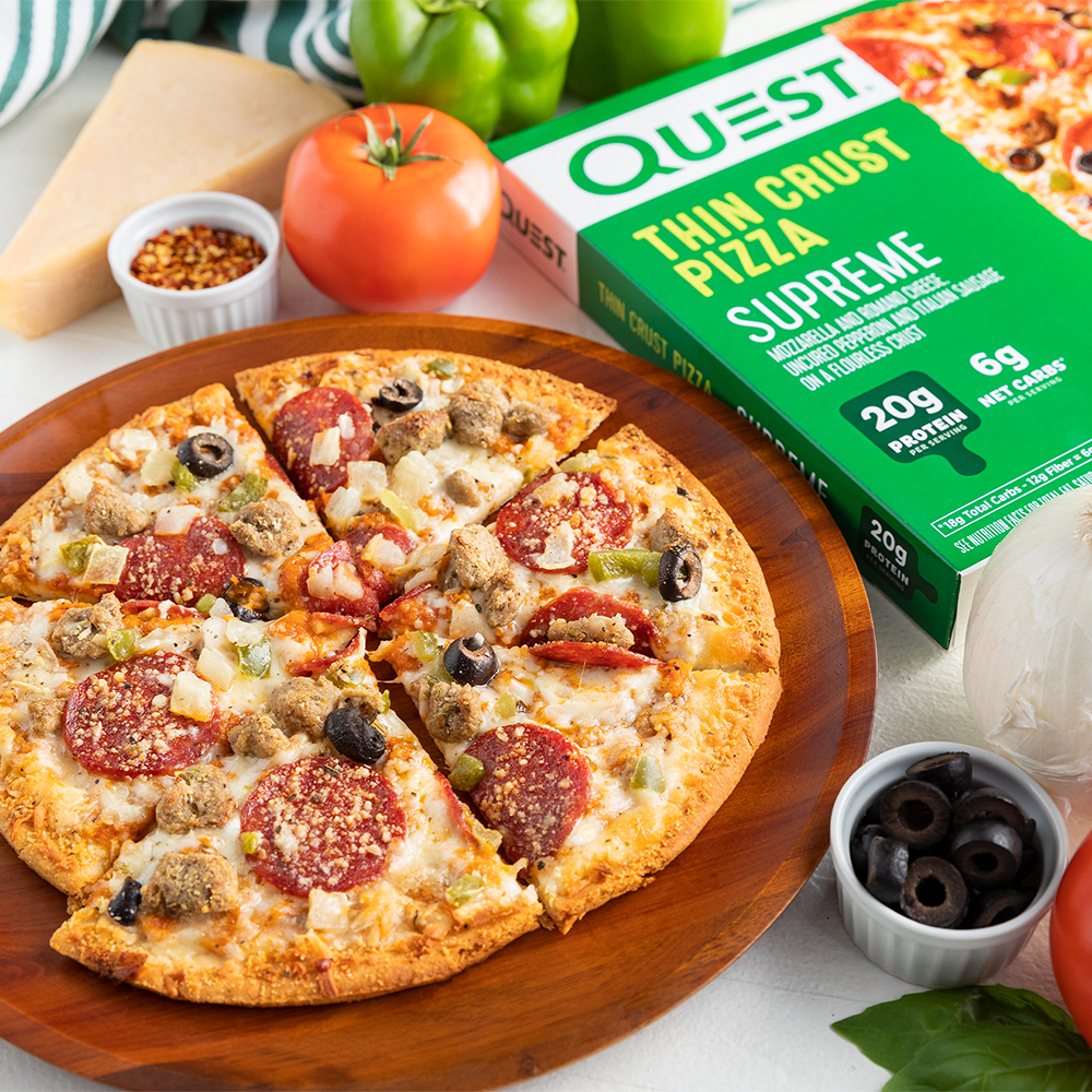 supreme-pizza-e1 QN_US_ThinCrustPizza_Supreme_103210_Tabletop_02.png
